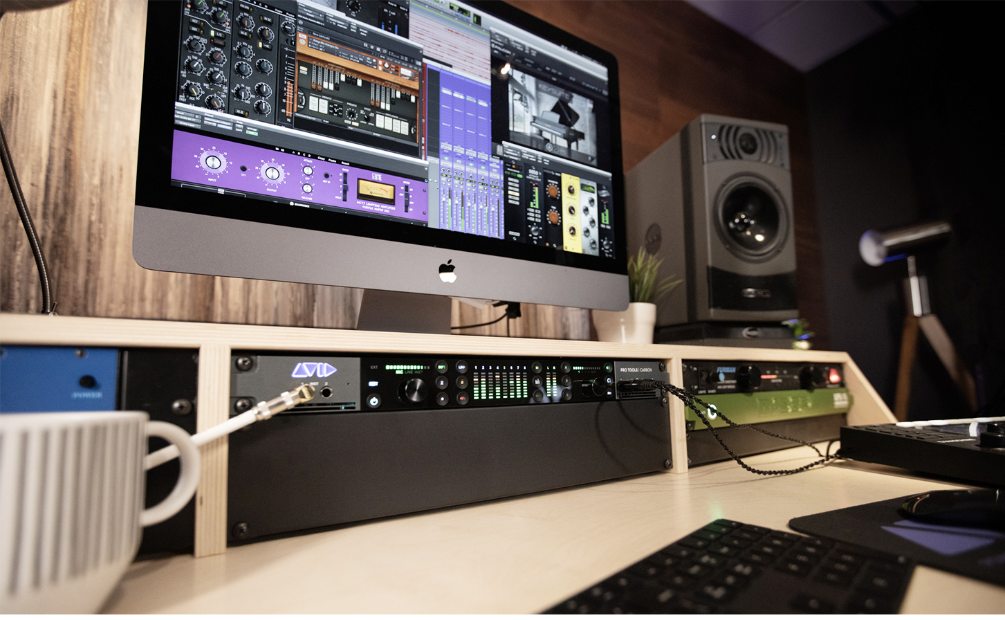 Avid Carbon Pro Tools audio interface in studio rack with iMac
